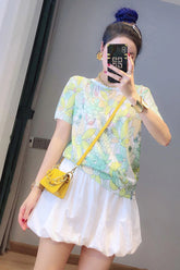 Camisa de punto con cuello redondo y estampado de flores